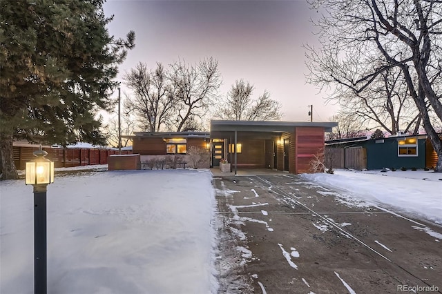 exterior space featuring a carport