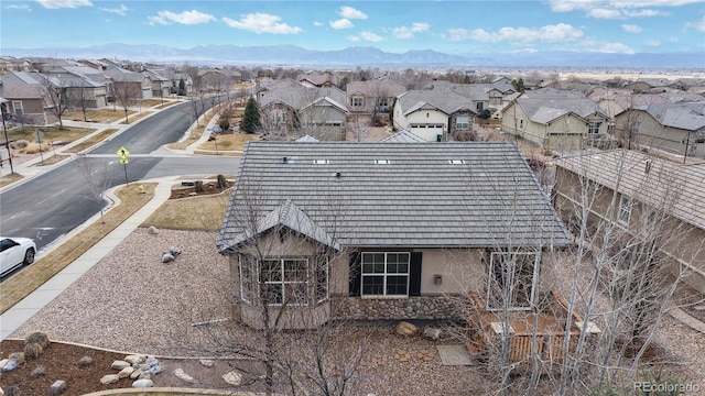 aerial view featuring a residential view and a mountain view