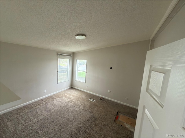 201 Valdai St, Brighton, CO 80603 - carpeted empty room featuring a textured ceiling and baseboards