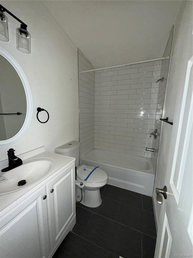 201 Valdai St, Brighton, CO 80603 - full bathroom with tile patterned flooring, toilet, vanity, and shower / washtub combination