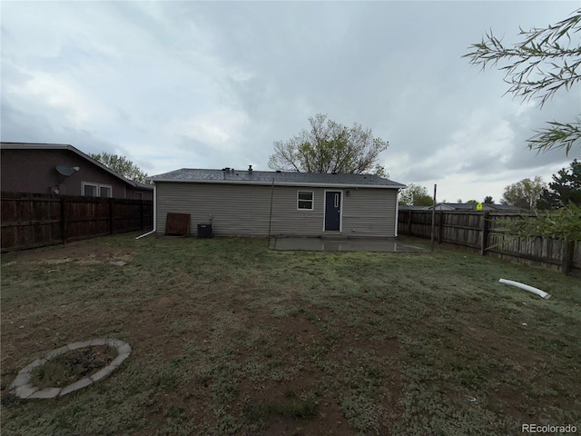 201 Valdai St, Brighton, CO 80603 - back of property with a patio area and cooling unit