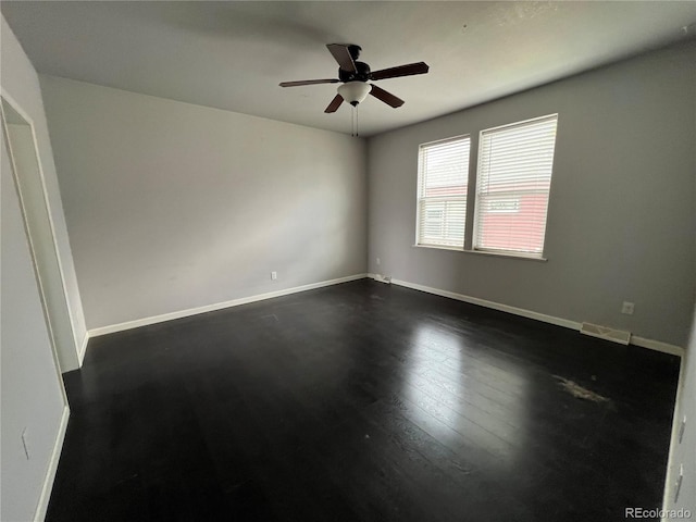 6100 Bluestem Unit 238, Frederick, CO 80530 - unfurnished room featuring a ceiling fan and dark wood-type flooring