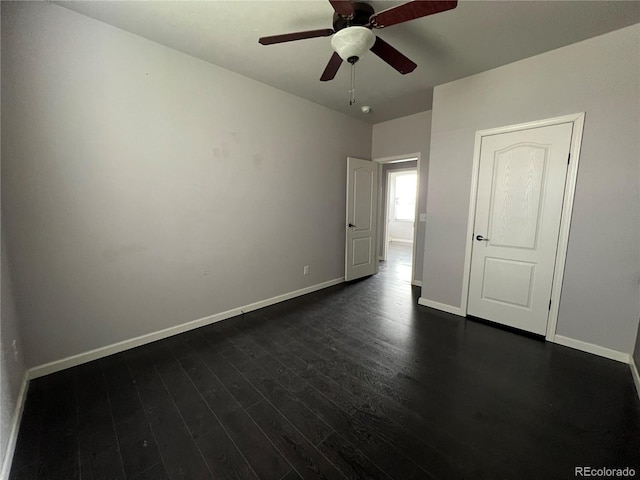 6100 Bluestem Unit 238, Frederick, CO 80530 - unfurnished bedroom with dark wood-type flooring and a ceiling fan