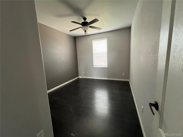 6100 Bluestem Unit 238, Frederick, CO 80530 - spare room with ceiling fan and dark wood-style floors