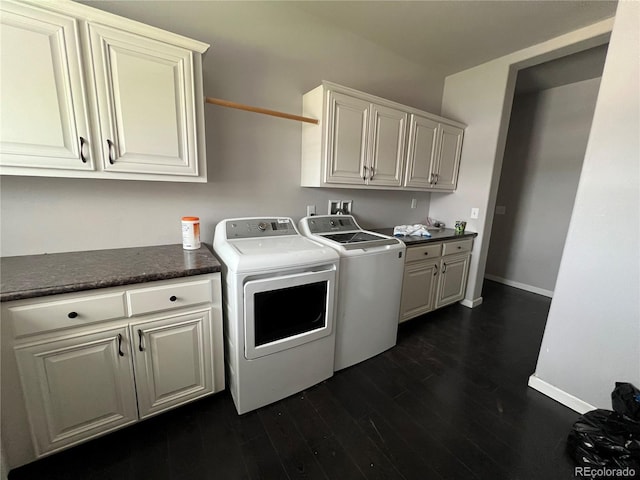 6100 Bluestem Unit 238, Frederick, CO 80530 - laundry area featuring cabinet space, washing machine and dryer, and dark wood-type flooring