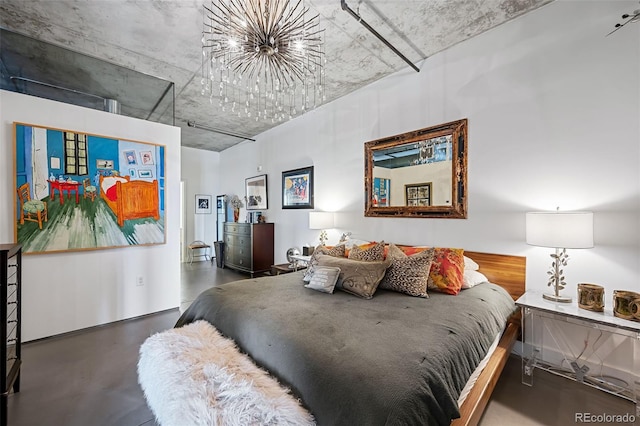 bedroom featuring concrete floors