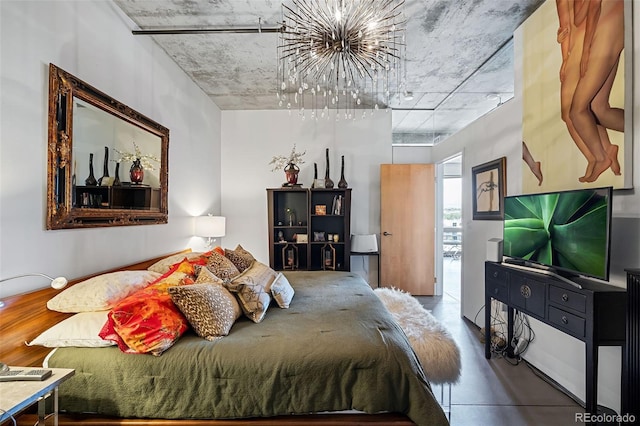 bedroom featuring a notable chandelier