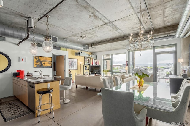 2100 16th St Unit 606, Denver, CO 80202 - dining area featuring a chandelier, visible vents, and concrete flooring