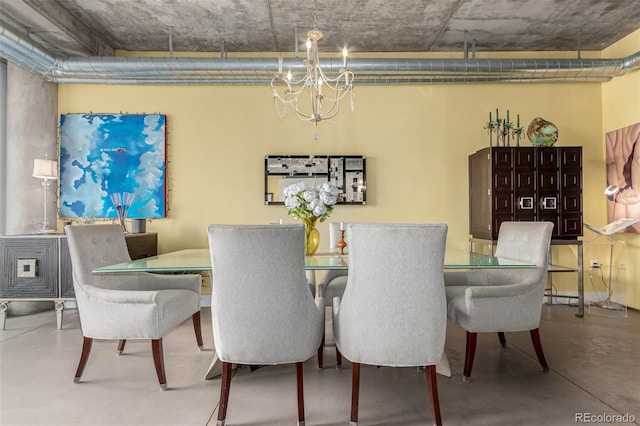 2100 16th St Unit 606, Denver, CO 80202 - dining space with finished concrete floors and a chandelier