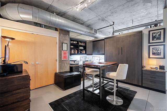 2100 16th St Unit 606, Denver, CO 80202 - dining space with concrete floors and visible vents