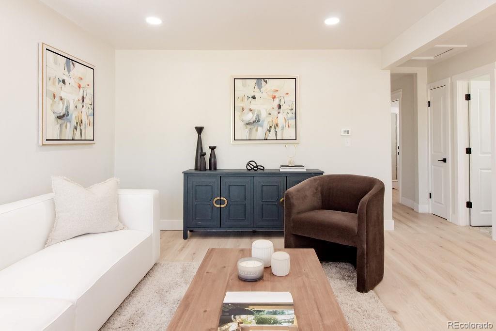 3728 W Exposition Ave, Denver, CO 80219 - living room featuring light wood-style flooring, recessed lighting, and baseboards