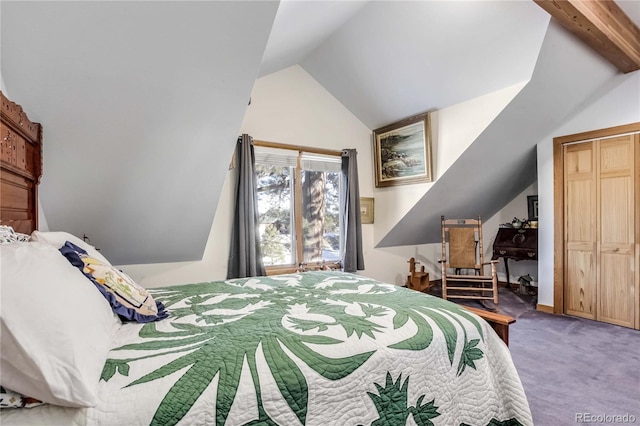 bedroom featuring carpet flooring and vaulted ceiling