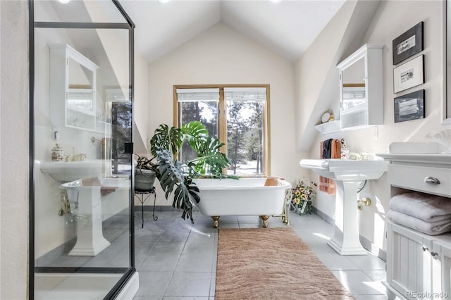 bathroom featuring lofted ceiling, tile patterned flooring, and plus walk in shower