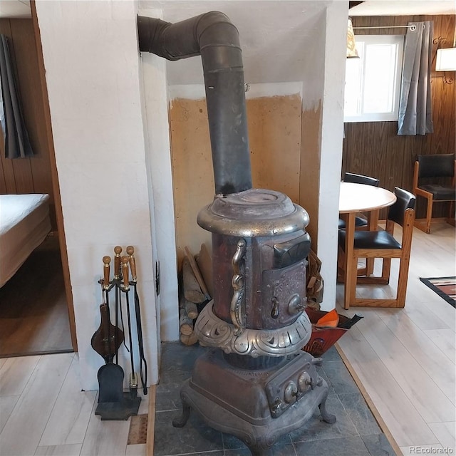 33 S Oak St, Alma, CO 80420 - detailed view of a wood stove, wood walls, and wood finished floors