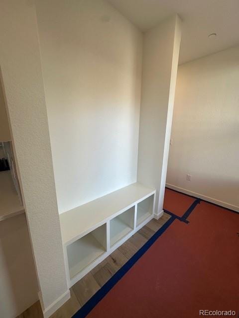 mudroom with hardwood / wood-style flooring