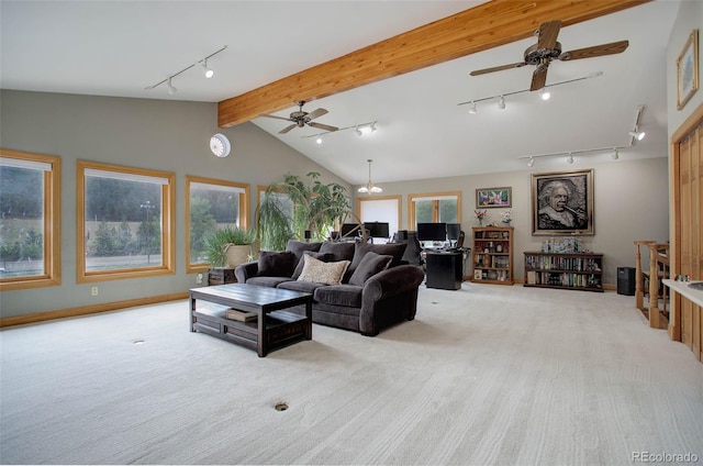 carpeted living room with vaulted ceiling with beams and ceiling fan