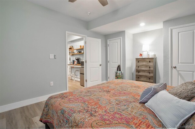 9 N Waterloo St, Aurora, CO 80018 - bedroom featuring light wood-style flooring, baseboards, and a ceiling fan
