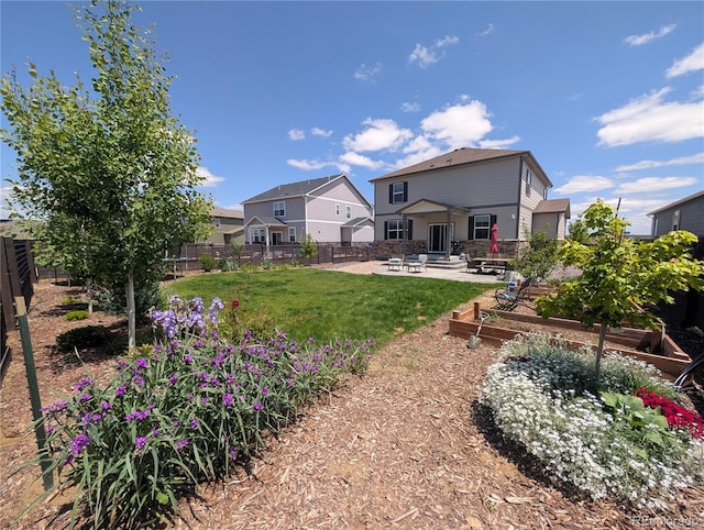 9 N Waterloo St, Aurora, CO 80018 - view of yard with a garden and a patio area
