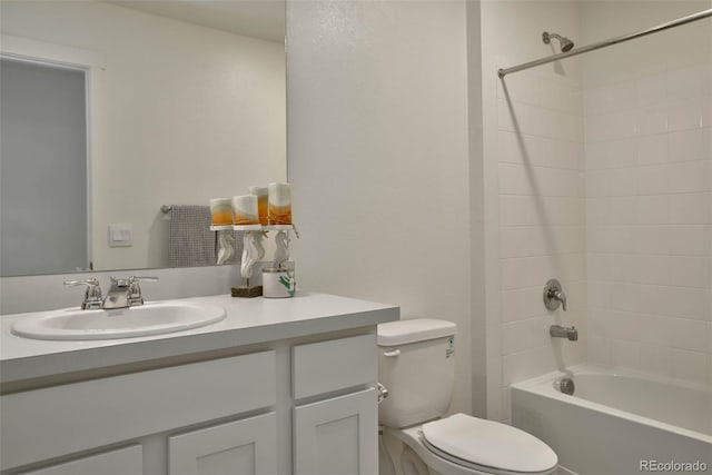 9 N Waterloo St, Aurora, CO 80018 - bathroom featuring toilet, vanity, and washtub / shower combination