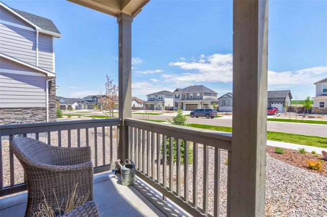 9 N Waterloo St, Aurora, CO 80018 - covered porch featuring a residential view