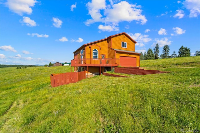 428 Ridge Dr, Divide, CO 80814 - rear view of property with a garage and a rural view