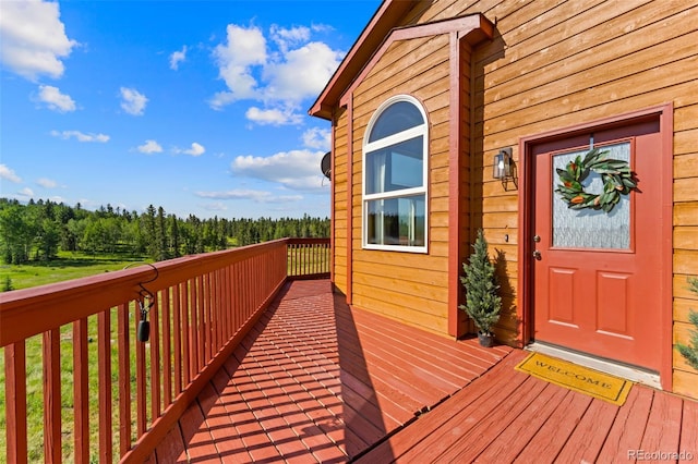 428 Ridge Dr, Divide, CO 80814 - wooden terrace featuring a forest view
