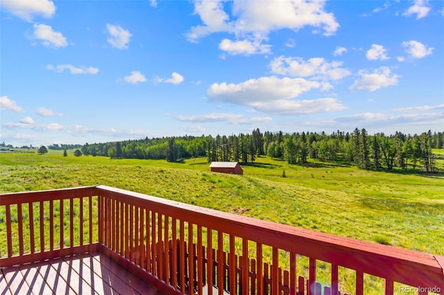428 Ridge Dr, Divide, CO 80814 - wooden terrace featuring a view of countryside and a forest view