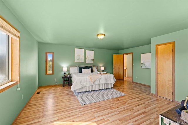 428 Ridge Dr, Divide, CO 80814 - bedroom featuring light wood finished floors and multiple windows