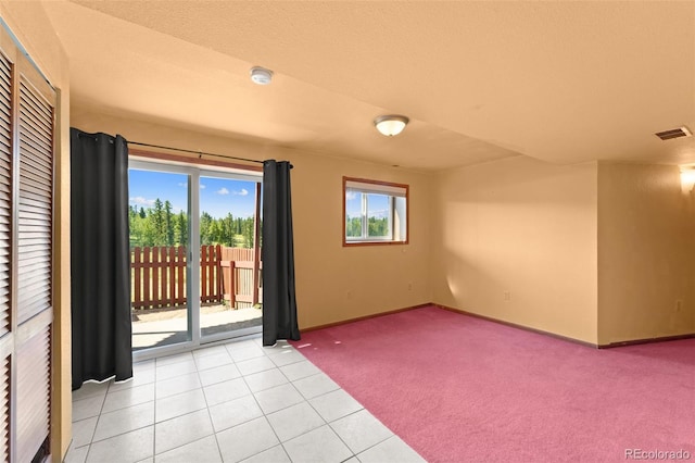 428 Ridge Dr, Divide, CO 80814 - unfurnished room with light colored carpet and light tile patterned floors
