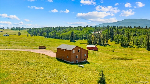 428 Ridge Dr, Divide, CO 80814 - overview of rural landscape featuring a mountain backdrop and a forest