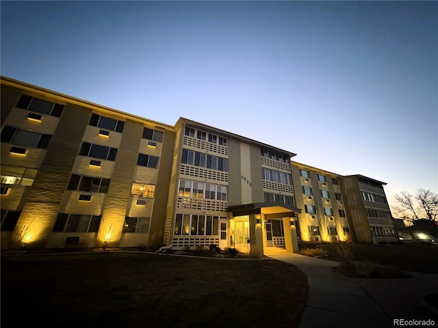 view of property at dusk