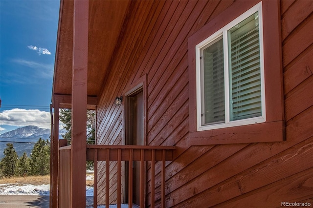 view of side of property with a mountain view