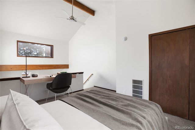 carpeted bedroom featuring beam ceiling, visible vents, built in desk, and high vaulted ceiling