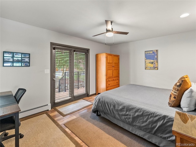 bedroom featuring ceiling fan, wood finished floors, access to exterior, a baseboard heating unit, and recessed lighting