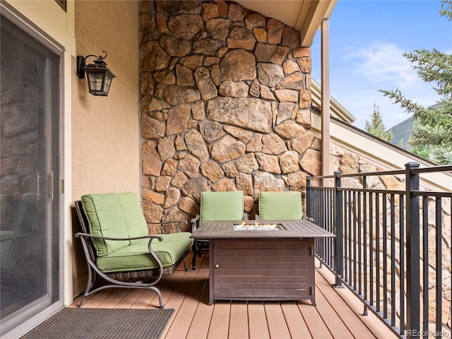 balcony with an outdoor fire pit