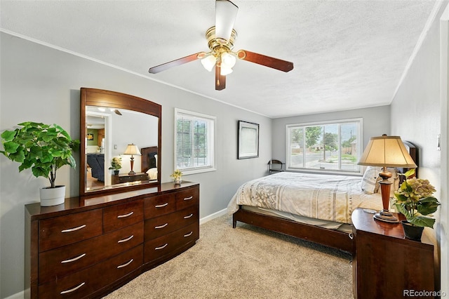 2461 Niagara St, Denver, CO 80207 - bedroom with light colored carpet, crown molding, a ceiling fan, and a textured ceiling