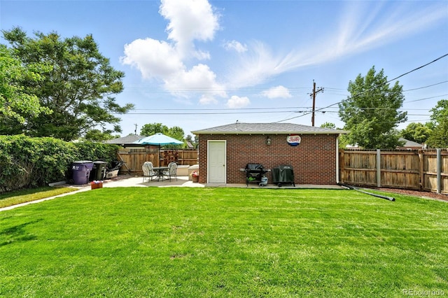 2461 Niagara St, Denver, CO 80207 - back of house featuring a patio area, a fenced backyard, brick siding, and an outbuilding