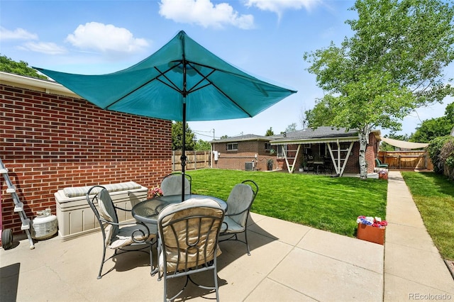 2461 Niagara St, Denver, CO 80207 - fenced backyard featuring a patio area and outdoor dining area