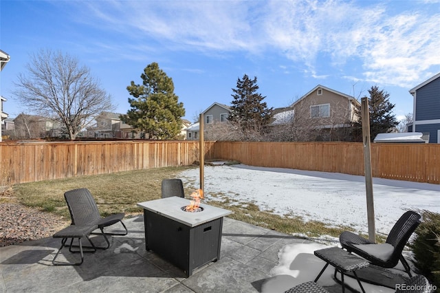 view of patio featuring a fire pit