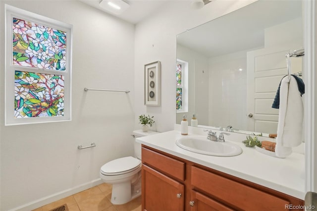 8926 Swan River St, Littleton, CO 80125 - bathroom with vanity, tile patterned floors, and a shower