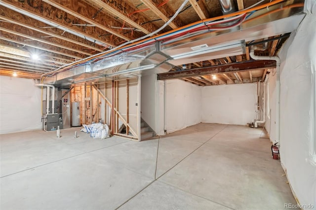 8926 Swan River St, Littleton, CO 80125 - unfinished basement with electric water heater and heating unit