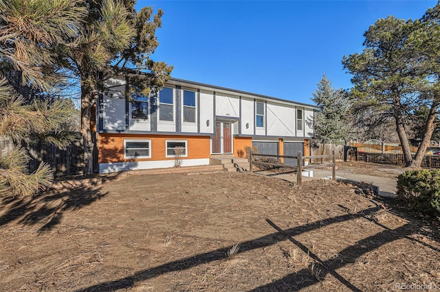 raised ranch with a garage