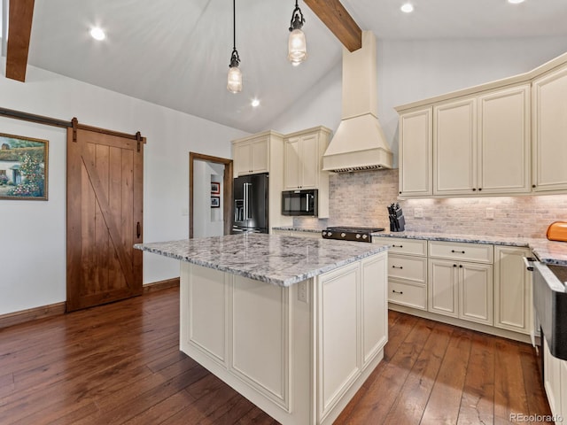3124 Antelope Ridge Trl, Parker, CO 80138 - kitchen featuring black appliances, cream cabinets, dark wood-style floors, custom range hood, and recessed lighting