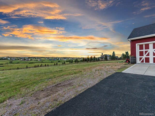 3124 Antelope Ridge Trl, Parker, CO 80138 - yard at dusk featuring a view of rural / pastoral area