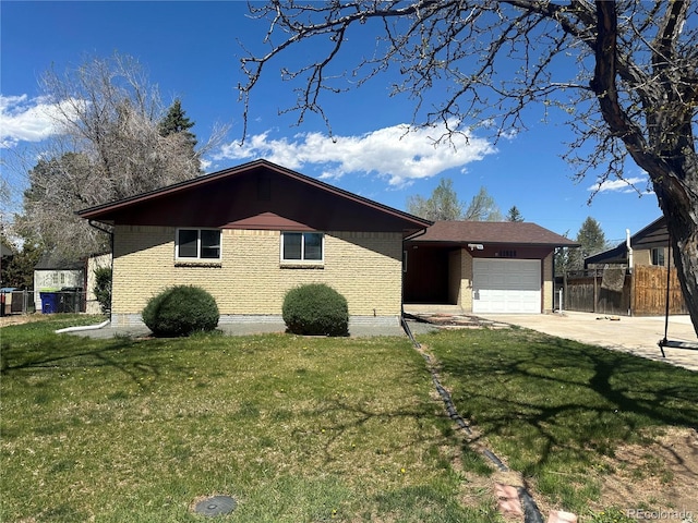 11623 E Virginia Dr, Aurora, CO 80012 - view of front of property with concrete driveway, fence, a front yard, and a garage
