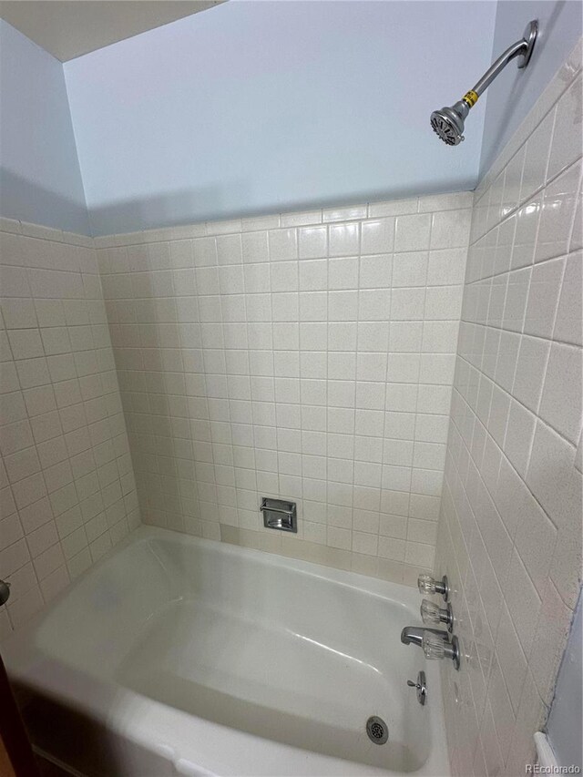 11623 E Virginia Dr, Aurora, CO 80012 - bathroom featuring shower / washtub combination