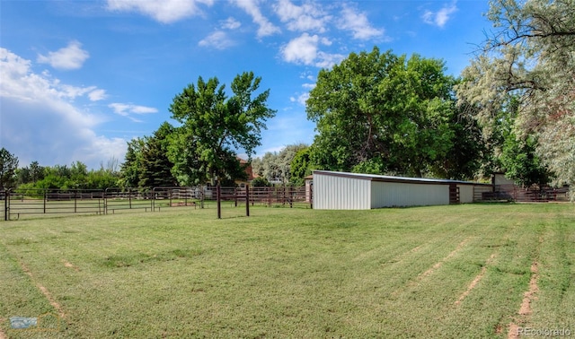 1813 Pikes Peak St, Erie, CO 80516 - view of yard featuring an outbuilding and a rural view