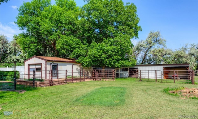 1813 Pikes Peak St, Erie, CO 80516 - view of yard featuring an exterior structure and an outbuilding