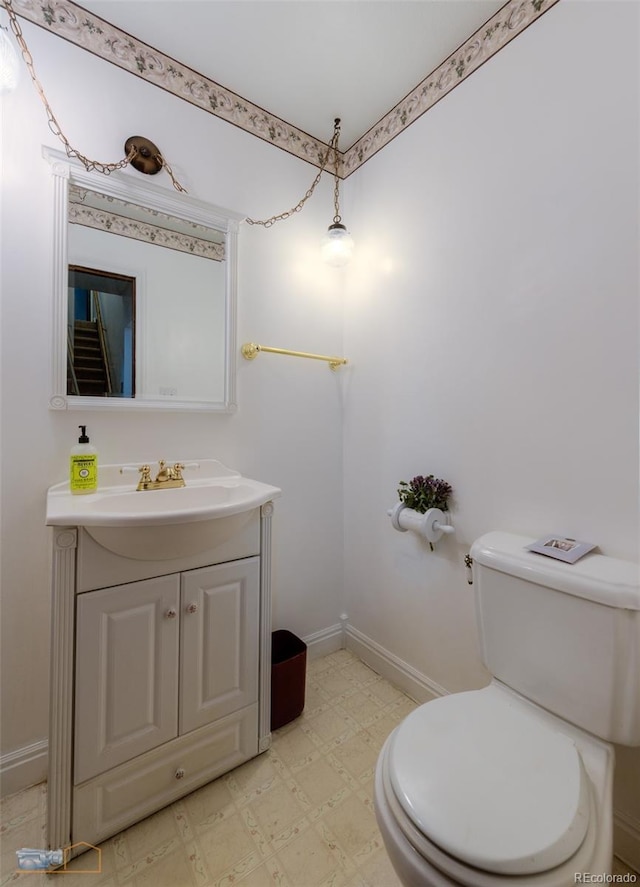 1813 Pikes Peak St, Erie, CO 80516 - half bath featuring vanity and tile patterned floors
