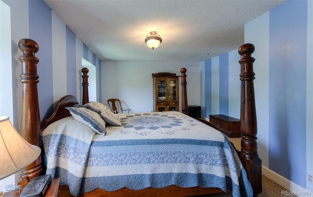 1813 Pikes Peak St, Erie, CO 80516 - bedroom with carpet and a textured ceiling